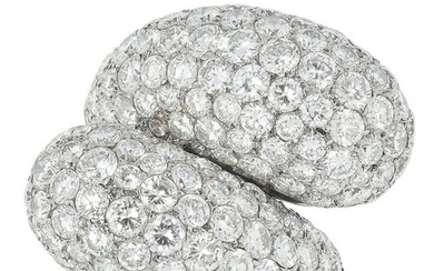 A DIAMOND CROSSOVER RING the twisted bombe design set