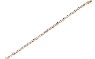 A DIAMOND LINE BRACELET IN 18CT GOLD, COMPRISING FIFTY SIX ROUND BRILLIANT CUT DIAMONDS TOTALLING 5.98CTS, LENGTH 180MM