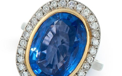 A FRENCH CEYLON NO HEAT SAPPHIRE AND DIAMOND RING in 18ct white and yellow gold, set with an oval