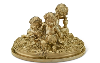 A FRENCH SILVER-GILT FIGURAL GROUP OF THREE PUTTI MARK OF ANDRE AUCOC, PARIS, CIRCA 1900
