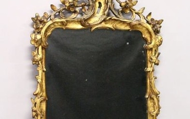 A GOOD VICTORIAN GILT WOOD AND COMPOSITE MIRROR, with