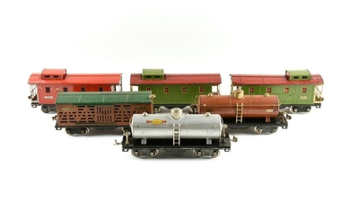 A GROUP OF LIONEL TRAIN TRACK SEGMENTS, SWITCHES, CAR