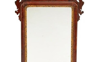 A George III Style Parcel Gilt Mahogany Mirror