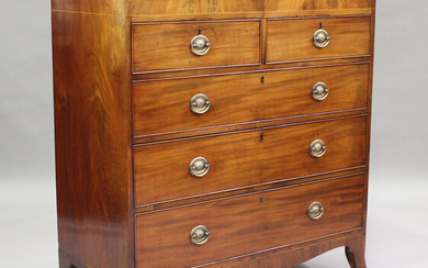 A George III mahogany chest of two short and three long drawers, on splayed bracket feet, height 111
