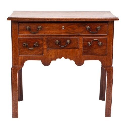 A George III mahogany rectangular lowboy:, the top with a mo...