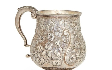 A George III silver mug, London, c.1818, J. E. Terrey & Co., of repousse baluster form with double scroll handle, the body decorated with flower and scroll motifs, 9.8cm high, approx. weight 6.7oz