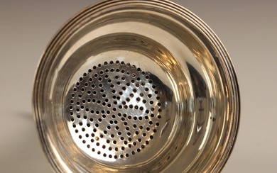 A George III silver wine funnel, indistinct makers mark, Lon...