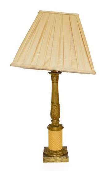 A Gilt Bronze Table Lamp, in Louis XVI style, of...
