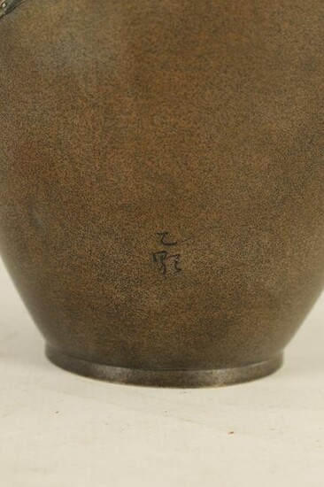 A JAPANESE MIEJI PERIOD BRONZE AND MIXED METAL VASE BY