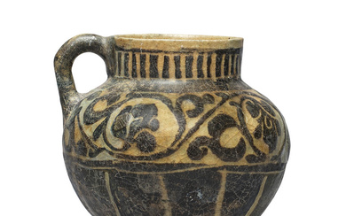 A Kashan silhouette ware pottery jug Persia, 12th/ 13th Century