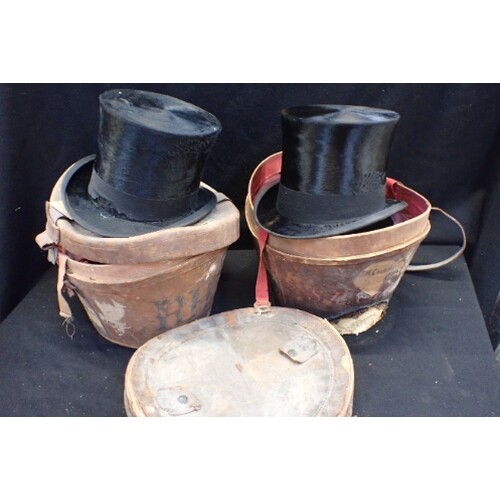 A LOCK & CO. TOP HAT IN (DAMAGED) HAT BOX (small size) and a...