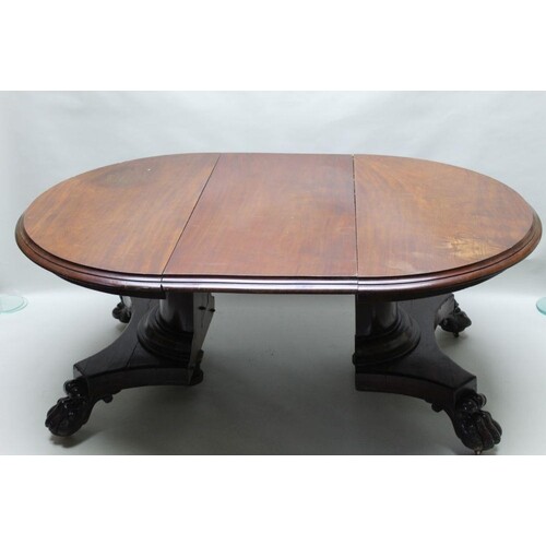 A MID VICTORIAN MAHOGANY FINISHED EXTENDING DINING TABLE whe...
