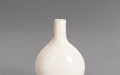 A MOLDED AND CREAM-GLAZED CERAMIC FLASK, MING DYNASTY