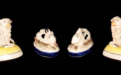A PAIR OF 19TH CENTURY STAFFORDSHIRE HOLLOW BASE FIGURES modelled...
