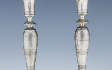 A PAIR OF EARLY SILVER CANDLESTICKS. Germany, 19th century....