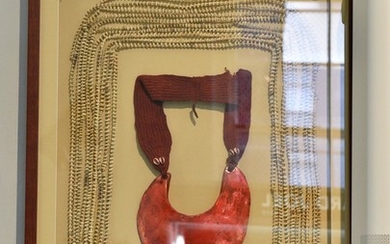 A PNG FRAMED DISPLAY OF SHELL NECKLACES