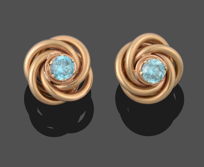A Pair of Blue Zircon Knot Earrings, the round cut...