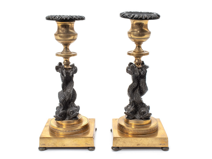 A Pair of French Gilt Bronze and Ebonized Figural Candlesticks