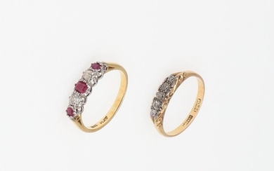 A RUBY AND DIAMOND FIVE STONE RING. mounted with three oval-...