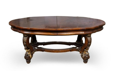 A Rococo Style Carved and Parcel Gilt Walnut Dining