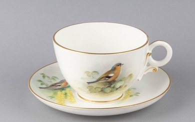 A Royal Worcester large teacup and saucer