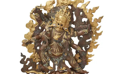 A Tibetan parcel gilt bronze statue of Shadbhuja Vajra Mahakala Early 20th...