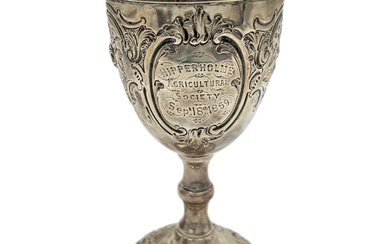 A VICTORIAN SILVER GOBLET WITH EMBOSSED DECORATION AND AN...