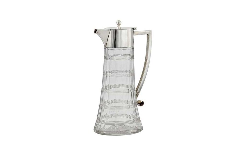 A Victorian sterling silver mounted glass claret jug, London 1900 by William Hutton and Sons