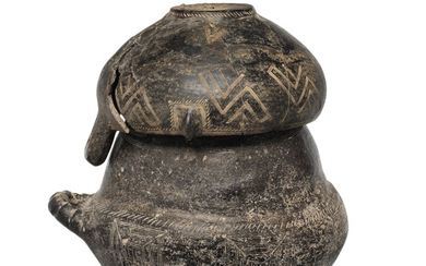 A Villanovan impasto ware biconical urn and lid