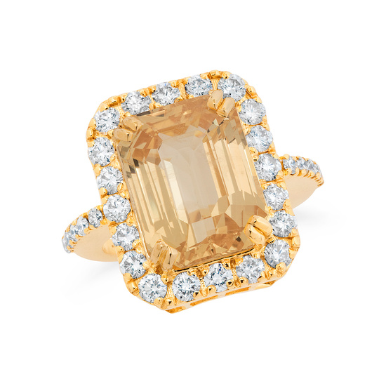 A Yellow Sapphire, Diamond and Gold Ring