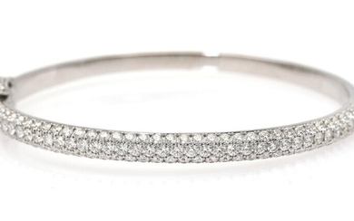 NOT SOLD. A bangle with a clasp set with numerous diamonds weighing a total of app. 4.50 ct., mounted in 18k white gold. L. app. 5x6 cm. – Bruun Rasmussen Auctioneers of Fine Art