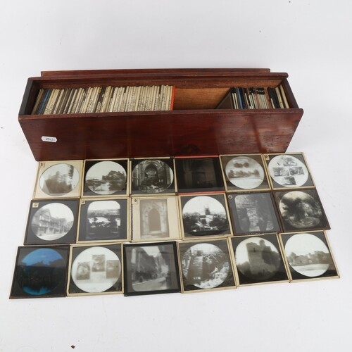 A case of Victorian glass Magic Lantern slides, including lo...