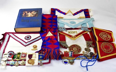 A collection of Masonic regalia, to include aprons, cuffs for...
