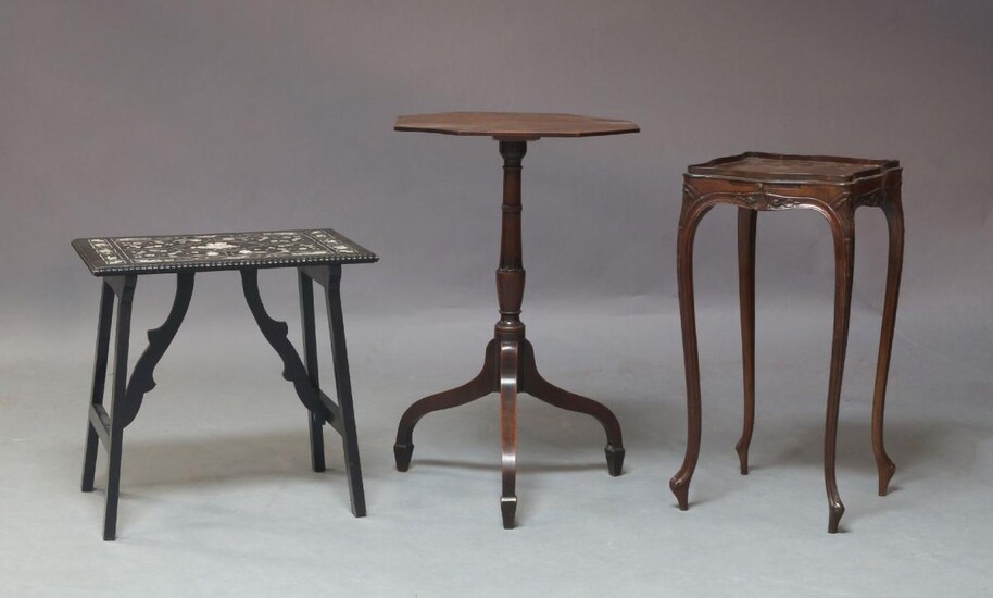 A collection of furniture, comprising an octagonal pedestal wine table, the top raised on a turned column and standing on downswept legs, 73cm high, 46cm diameter, a late 19th Century ebony veneered and ivory inlaid side table, together with a...