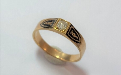 A diamond and black enamel memorial ring