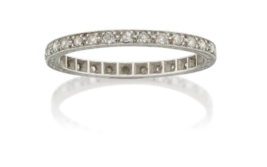 A diamond eternity ring, claw set with a single row of brilliant-cut diamonds, ring size approx. N