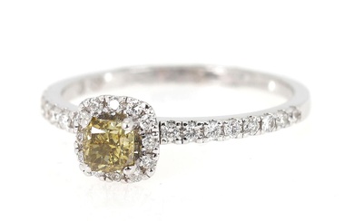 A diamond ring set with a cushion modified brilliant-cut diamond weighing app....