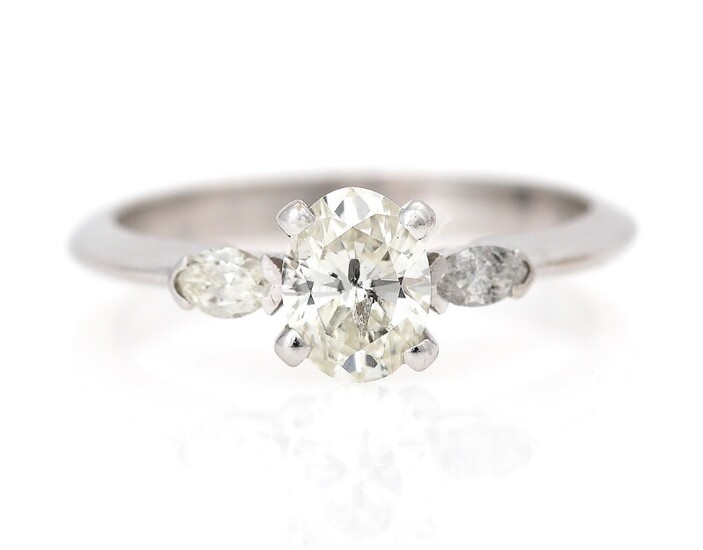 NOT SOLD. A diamond ring set with an oval brilliant-cut diamond weighing app. 0.75 ct....