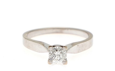 A diamond solitaire ring set with a brilliant-cut diamond, mounted in 14k white gold. Size 57.