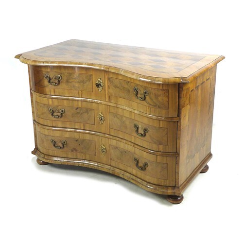 A good Continental serpentine fronted commode, 19th century,...