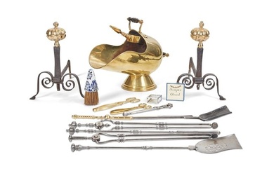 A group of brass, steel and iron fire tools
