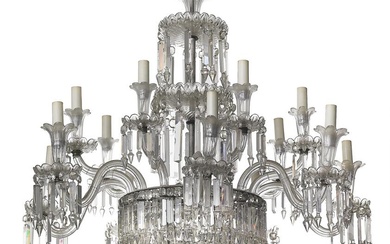 A large Bohemian glass and crystal chandelier with 14 lights in two levels, fitted with electricity. Early 20th century. H. 95 cm. Diam. 100 cm.