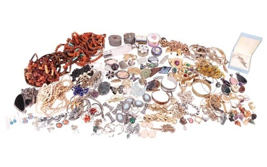 A large quantity of costume jewellery consisting of plated and silver necklaces, bracelets and earri