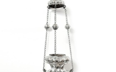 A large venetian silver votive lamp