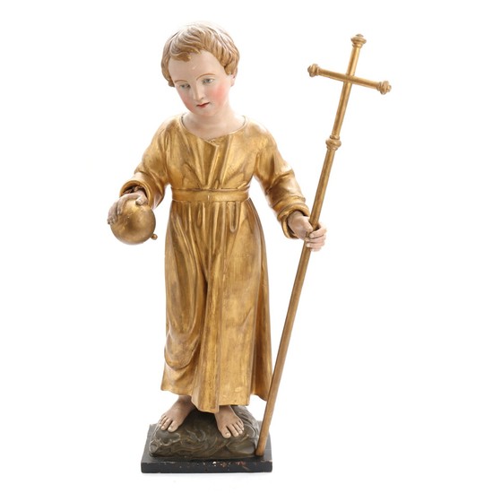 A late 19th century chalkware figure of the Child Jesus holding globe and cross. H. 86 cm.