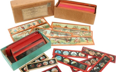 A lot with (2) boxes with Laterna magica or magic lantern glasses.