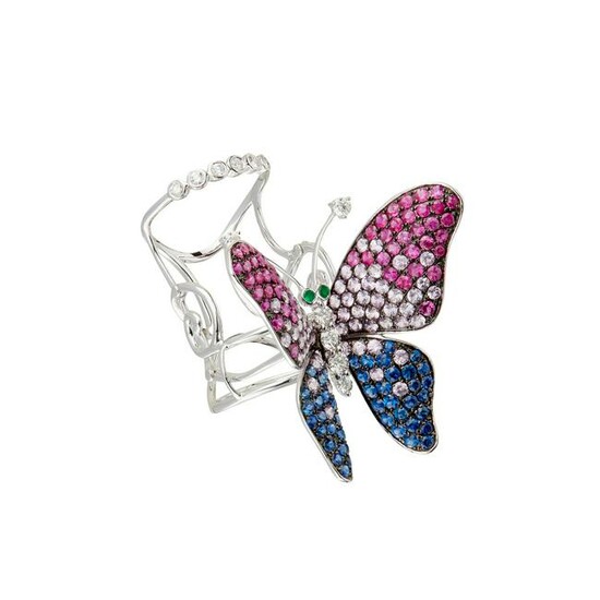 A multi-gem set butterfly ring