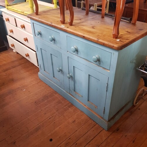 A painted pine dresser, having two drawers above two cupboar...
