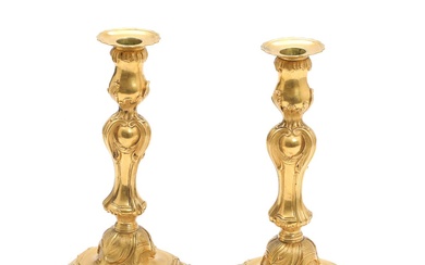 A pair of 19th century Rococo style gilt bronze candlesticks. H. 28...
