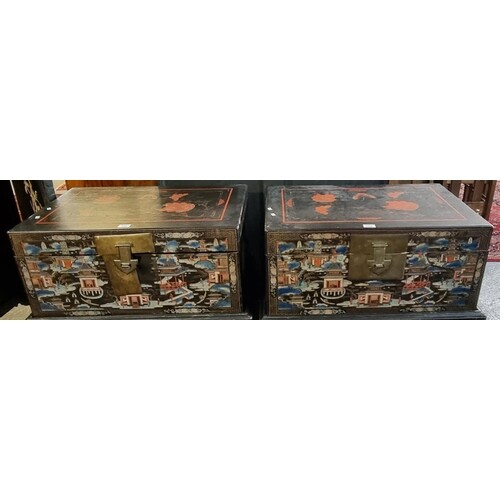 A pair of Chinese lacquered and painted travelling trunks or...